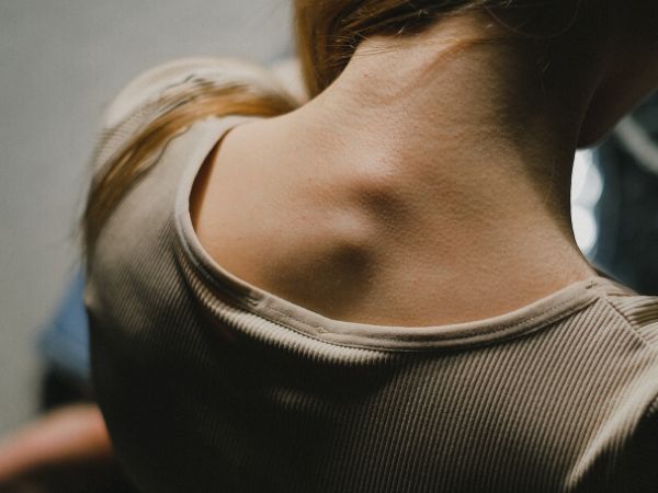 How may cervical kyphosis be avoided